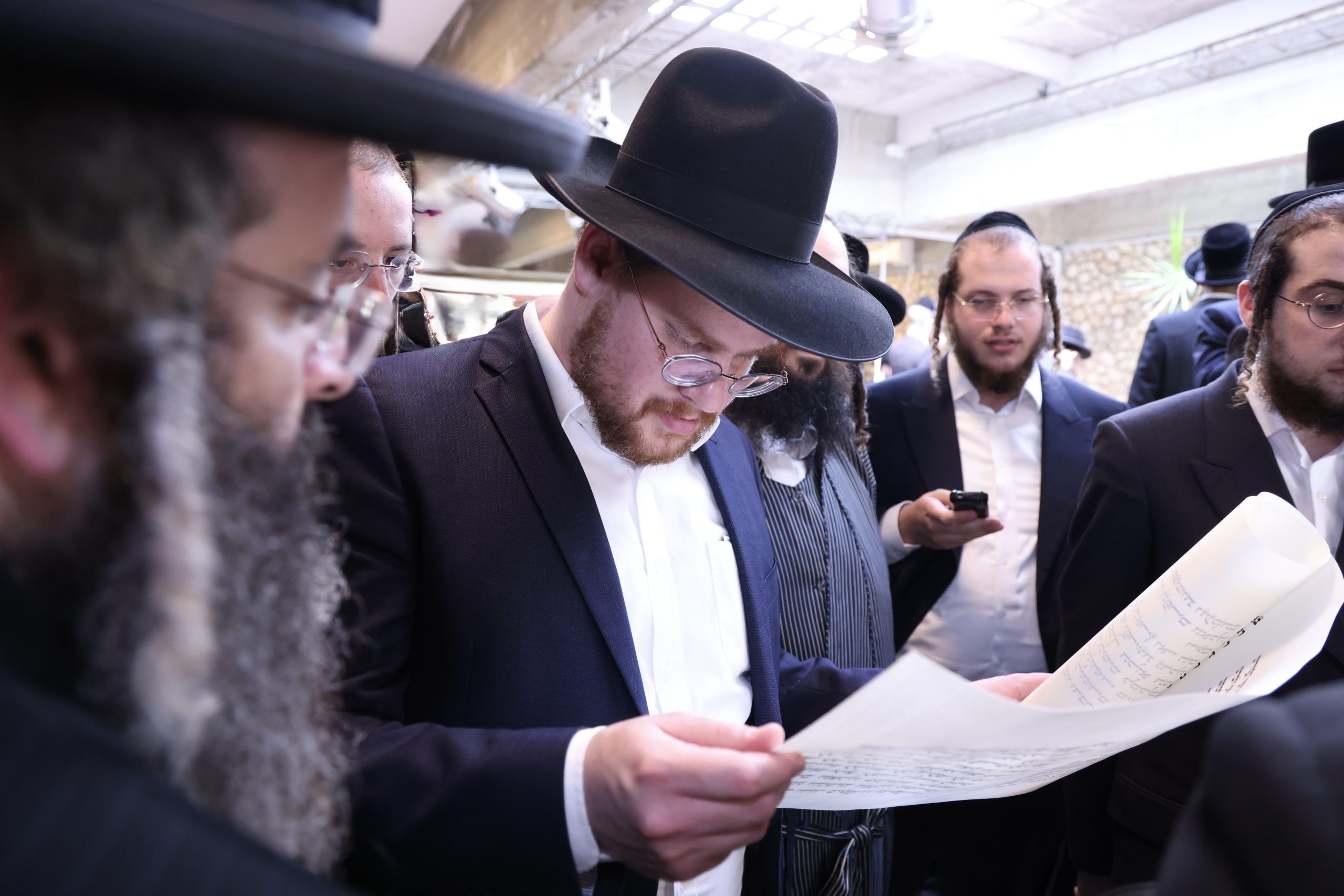 Rabbonim and Sofrim reviewing Sta"m together